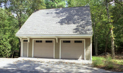 A custom design/build Carriage House garage.
